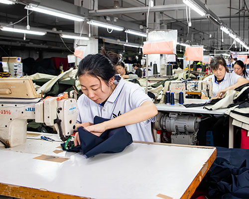 Our experienced workers are busy with sewing