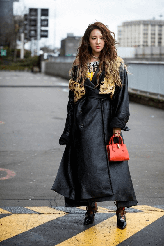 Sandara Park wearing long black leather jacket with leopard print