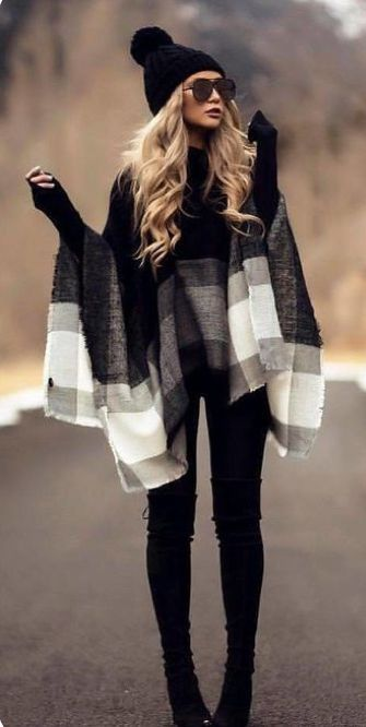 woman wearing beige coat and black boots