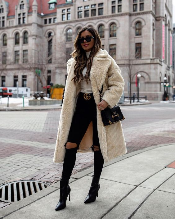 woman wearing big coat